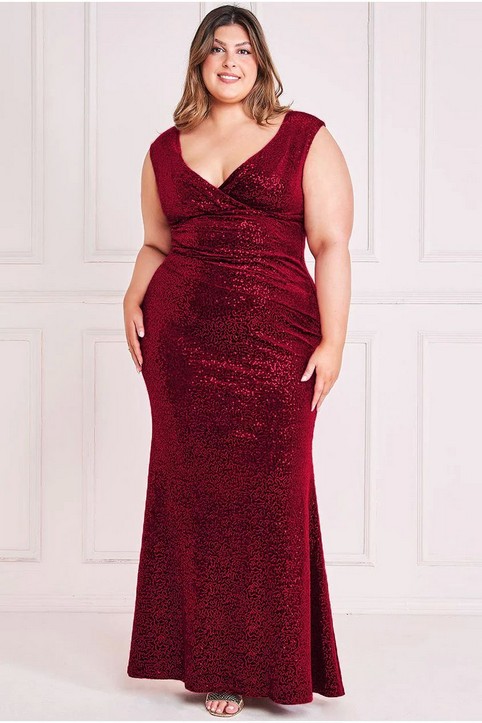 Новогодняя колекция вечерних платьев английского бренда Goddiva 2024